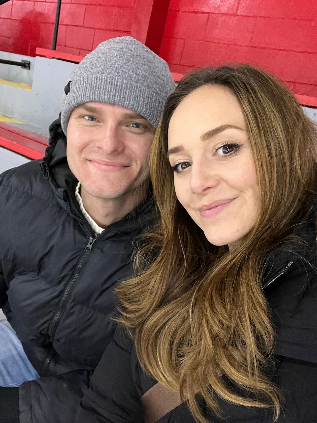 Dylan and Sammi Dreiling in a candid selfie together, bundled up in winter jackets